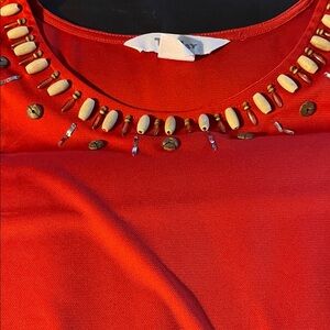 TanJay Terra cotta color we did neck line sleeveless top
